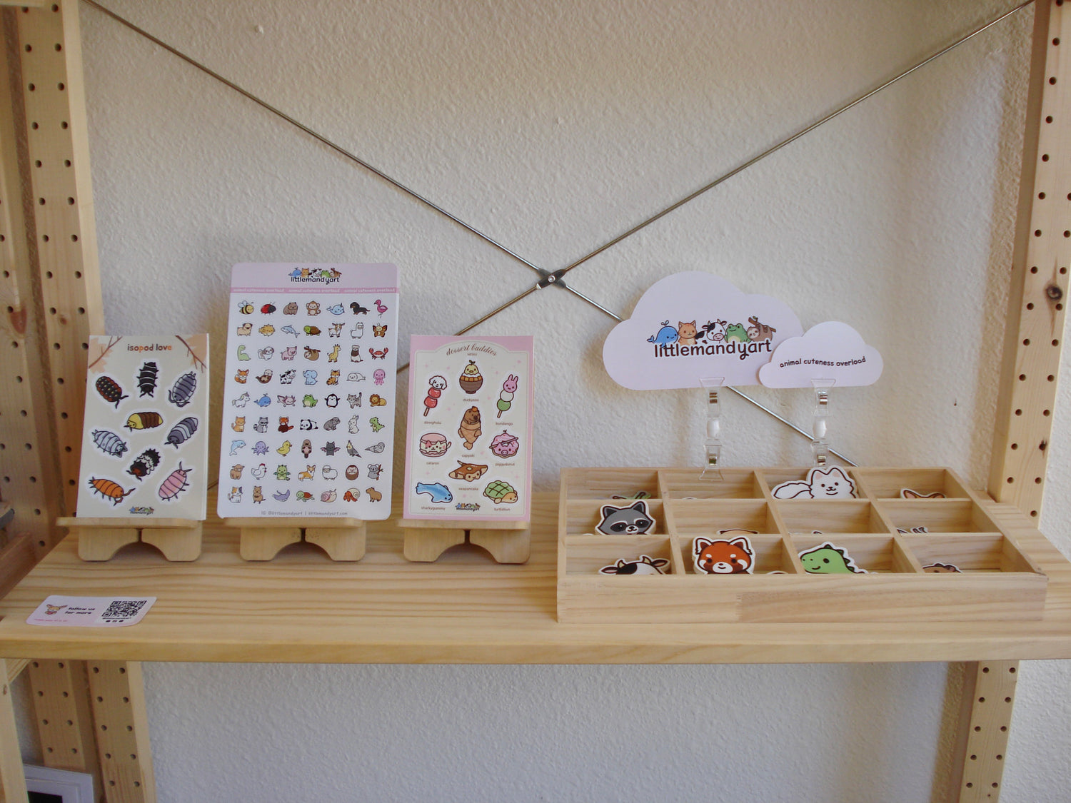 Pop-up at Cassa Jam, a gift shop in Fremont, California. Sticker sheets and stickers on a whimsical art shelf.